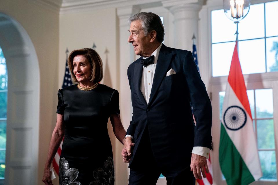 US Representative Nancy Pelosi (D- CA) and her husband Paul Pelosi arrive for an official State Dinner in honor of India's Prime Minister Narendra Modi, at the White House in Washington, DC, on June 22, 2023. (Photo by Stefani Reynolds / AFP) (Photo by STEFANI REYNOLDS/AFP via Getty Images)