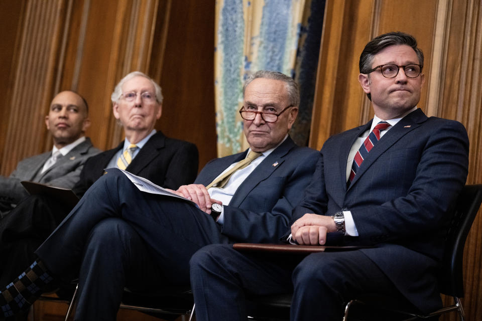 UNITED STATES - DECEMBER 12: From left, House Minority Leader Hakeem Jeffries, D-N.Y., Senate Minority Leader Mitch McConnell, R-Ky., Senate Majority Leader Charles Schumer, D-N.Y., and Speaker of the House Mike Johnson, R-La., attend a Menorah lighting to celebrate the eight-day festival of Hanukkah, in the U.S. Capitol on Tuesday, December 12, 2023. (Tom Williams/CQ-Roll Call, Inc via Getty Images)