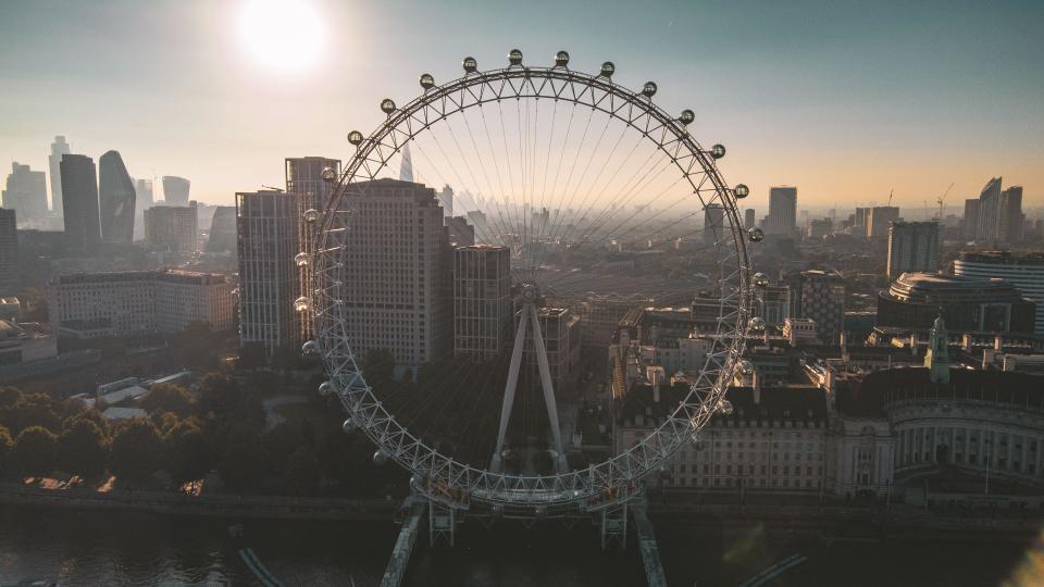 An aerial photograph showcasing a London cityscape. The FTSE was lower on Thursday