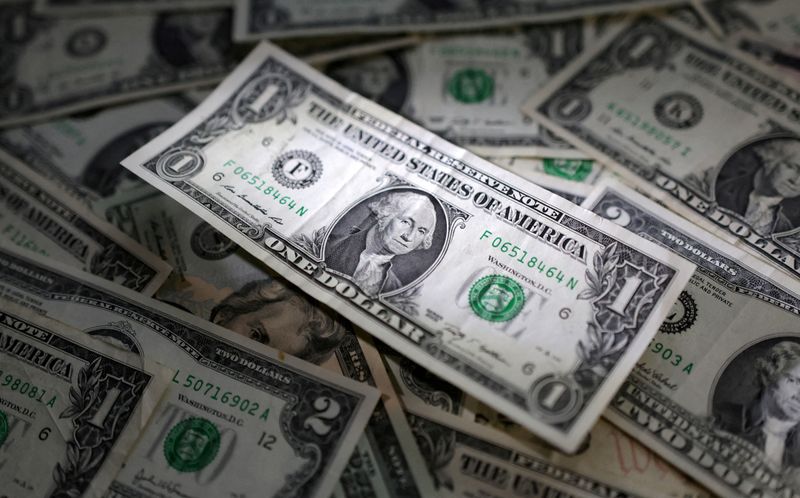 Dollar eyes monthly gain as markets look to Fed