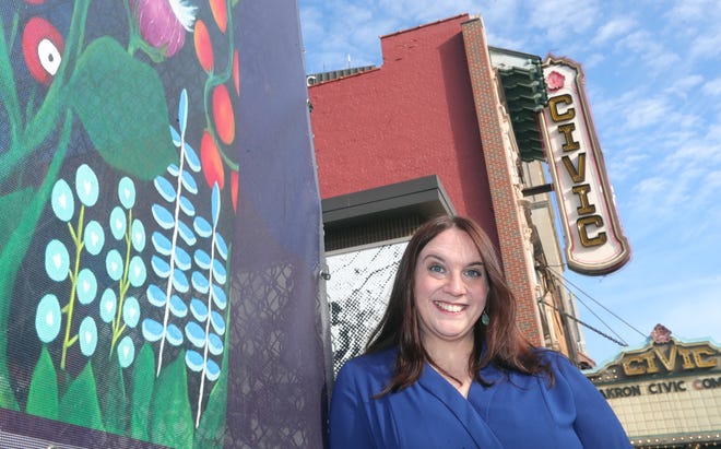 Development Finance Authority of Summit County Vice President Rachel Bridenstine stands outside the Akron Civic Theatre, one of many projects financed through the authority. Bridenstine will become president of the agency in 2025.