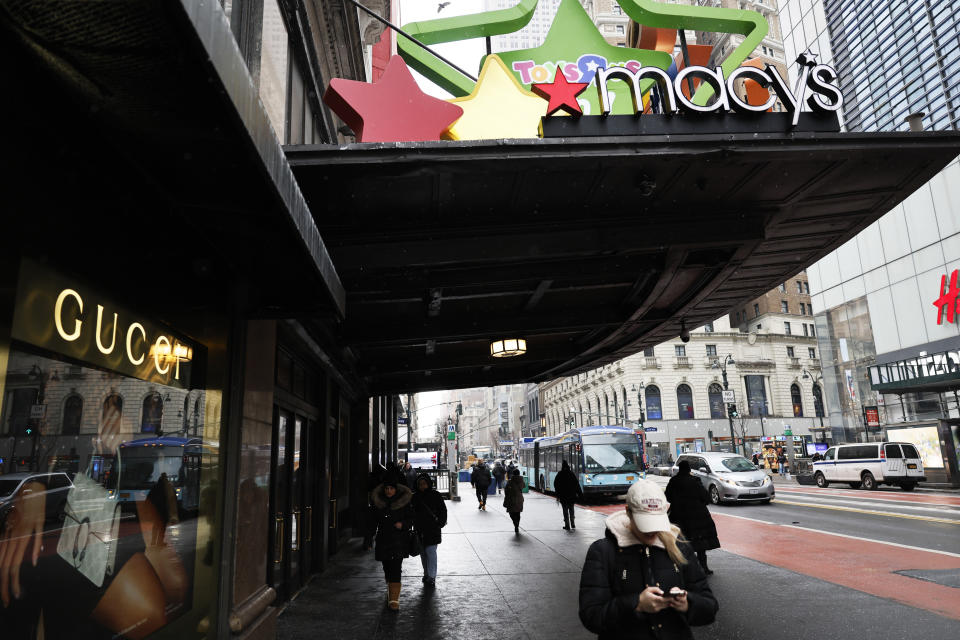 NEW YORK, NEW YORK - JANUARY 19: People walk past the Macy's store on Herald Square on January 19, 2024 in New York City. Macy's department-store chain announced that they will be laying off roughly 2,350 employees which is about 3.5% of their workforce. The company says that it will also be closing five stores in order to adjust to the online-shopping era. (Photo by Michael M. Santiago/Getty Images)