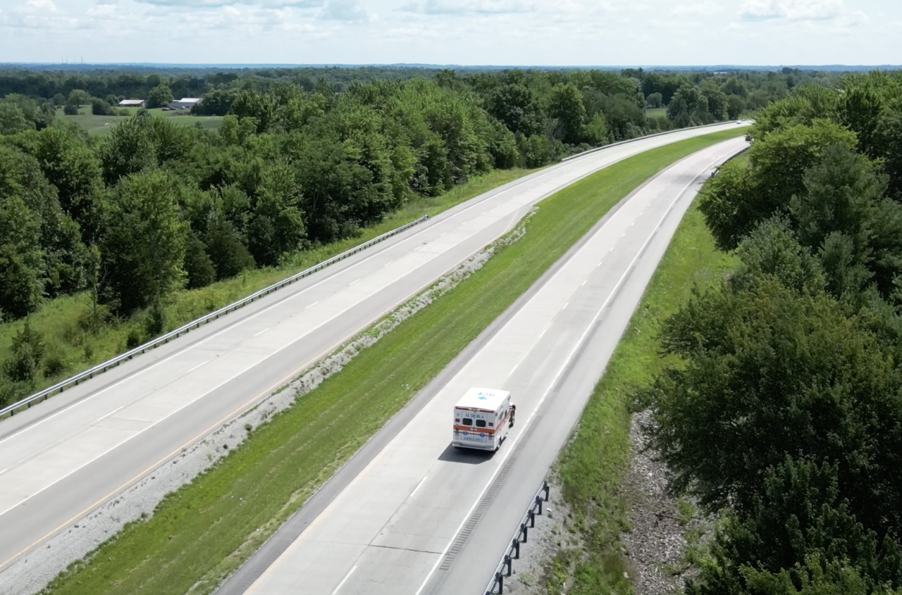 An Aurora ambulance returns home from a 20 mile round trip to Dillsboro 