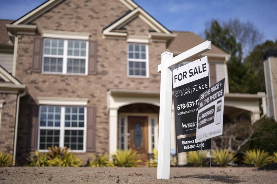 A for sale is displayed outside a home, Feb. 1, 2024, in Acworth, Ga. (Credit: Mike Stewart, AP Photo via Getty Images)