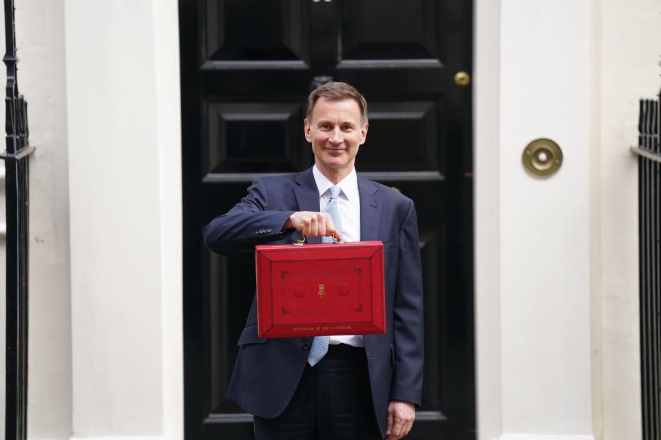 Jeremy Hunt leaves 11 Downing Street with his ministerial box before delivering his Budget (James Manning/PA) (PA Wire)