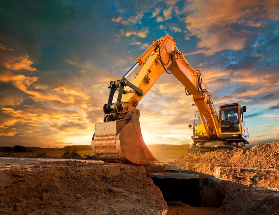 Construction machinery at a dig site. 