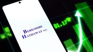 The logo for Berkshire Hathaway displayed on a smartphone screen.