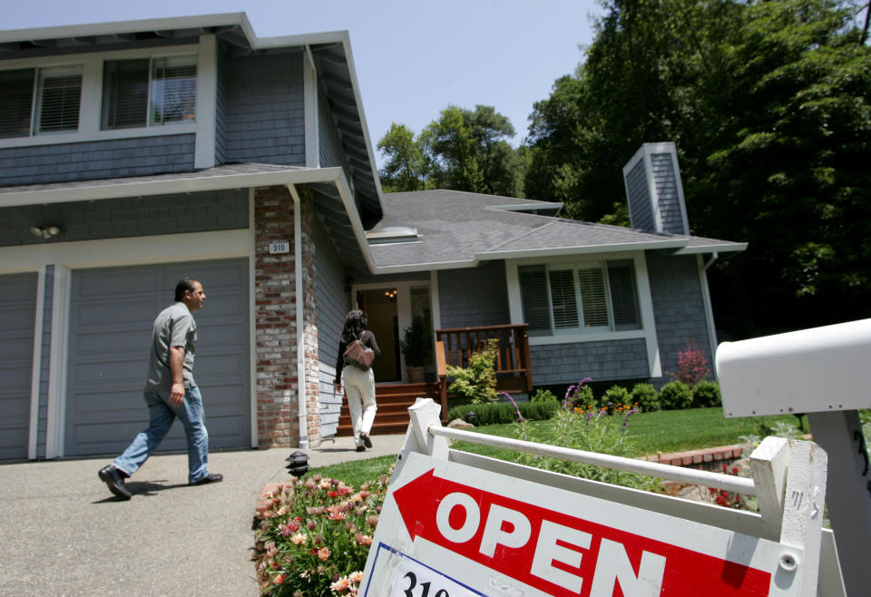 Real estate agents arrive at a brokers tour showing a house for sale in San Rafael, California. (Credit: Justin Sullivan, via Getty Images)