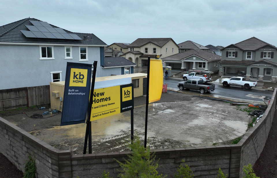 FOLSOM, CALIFORNIA - MARCH 22: In an aerial view, a sign is posted in front of a KB Home housing development on March 22, 2023 in Folsom, California. Homebuilder KB Home will report first quarter earnings today after the closing bell. (Photo by Justin Sullivan/Getty Images)