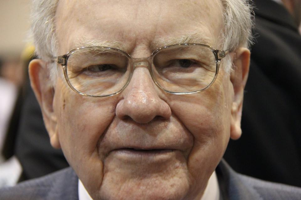 Warren Buffett mingling with the crowd at Berkshire Hathaway's annual shareholder meeting.