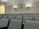 Photo shows rows of seats in the Henry County Schools board room (Clayton Carte photo).