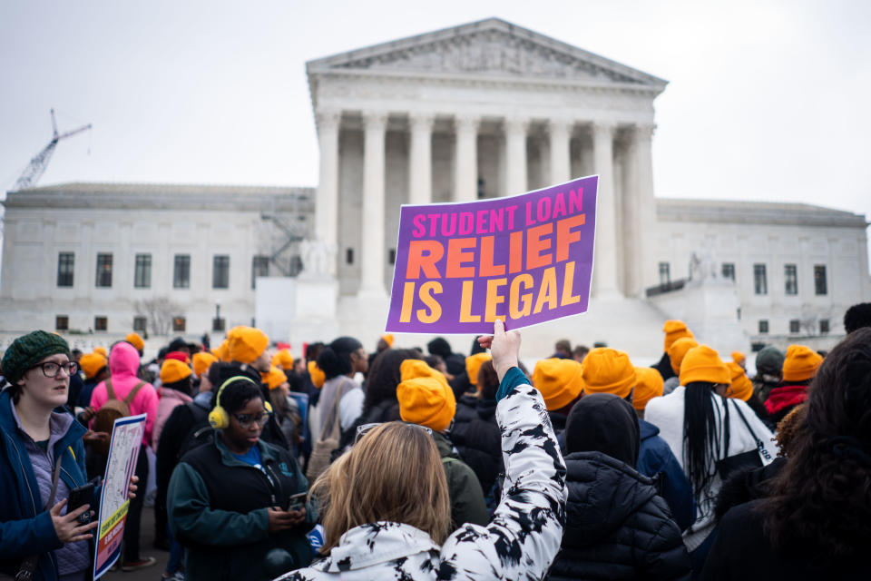 People rally to show support for the Biden administration's student debt relief plan in front of the the Supreme Court. (Credit: Kent Nishimura, Los Angeles Times via Getty Images)