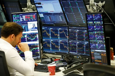 Traders at CMC Markets in London. The FTSE 100 hit several record intra-day highs and closes over what's been described as a "fantastic" week. Reuters