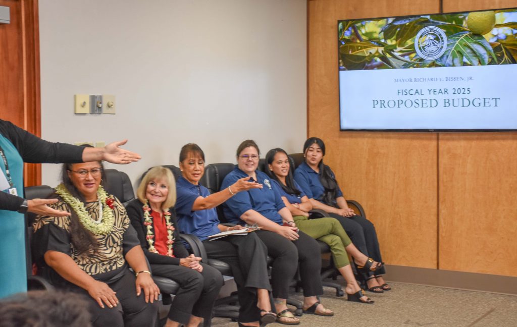 The Maui County team, led by Budget Director Maria Zielinski (red shirt) that put together Mayor Richard Bissen's proposed FY25 budget. (Cammy Clark/Civil Beat/2024)