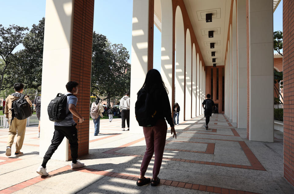 People gather on the campus of the University of Southern California (USC) on March 21, 2024 in Los Angeles, California. (Credit: Mario Tama, Getty Images)