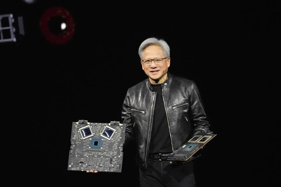 CEO Jensen Huang talks about processing units during the keynote address of Nvidia GTC in San Jose, Calif., Monday, March 18, 2024. (AP Photo/Eric Risberg)