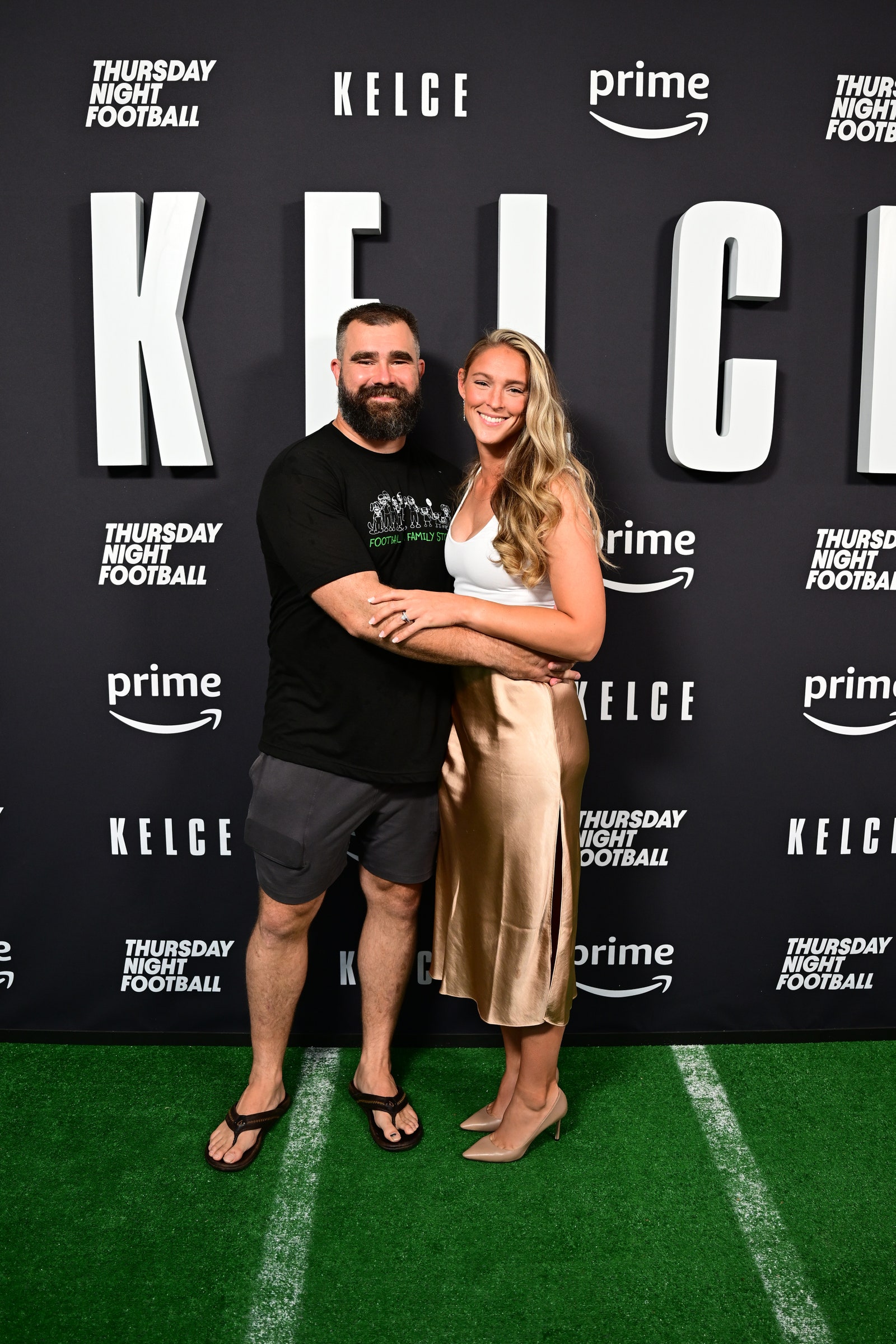 Image may contain Jason Kelce Clothing Footwear Sandal Fashion Adult Person Shoe Face Head and Photography