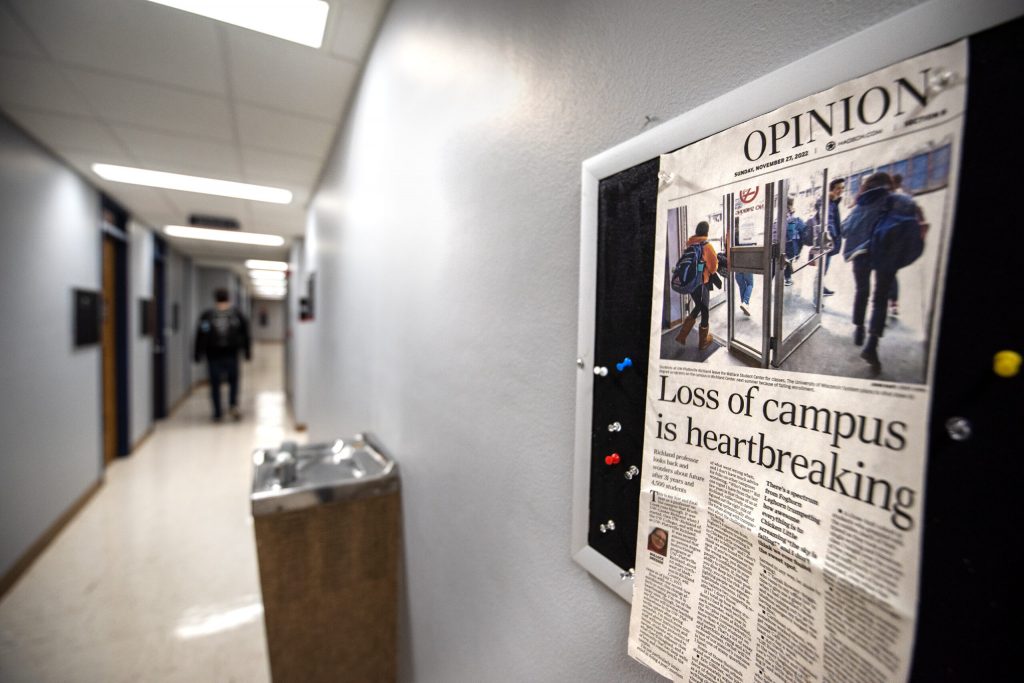 A newspaper page hangs on a billboard Wednesday, March 8, 2023, at University of Wisconsin-Platteville Richland in Richland Center, Wis. Angela Major/WPR