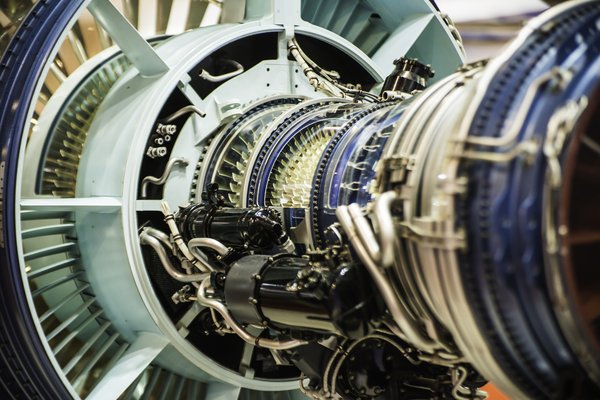 A close-up of part of an airplane engine is shown.