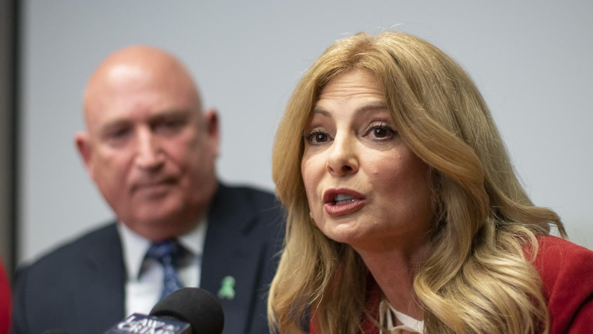 Lisa Bloom speaking at press conference