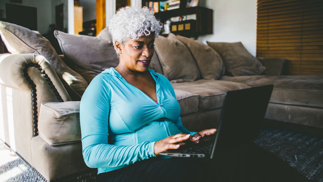 Elderly woman on laptop