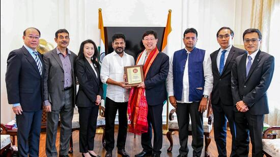 The Foxconn delegation led by Chairman Young Liu with Telangana Chief Minister Revanth Reddy, in New Delhi. State IT Minister D Sridhar Babu also present. (Telangana CMO-X)