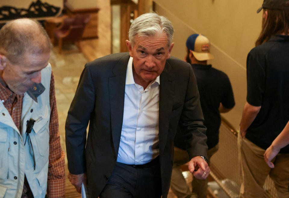 FILE PHOTO: Jerome Powell, chair of the Federal Reserve walks in Teton National Park where financial leaders from around the world gathered for the Jackson Hole Economic Symposium outside Jackson, Wyoming, U.S., August 26, 2022. REUTERS/Jim Urquhart