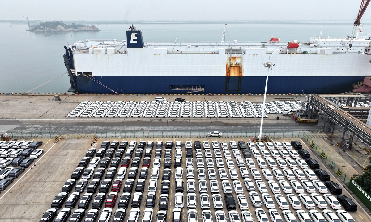 A cargo ship docks at a berth to load export vehicles at a terminal of Lianyungang Port in East China's Jiangsu province on July 11, 2024. China has exported about 485,000 cars to the world. Photo: VCG