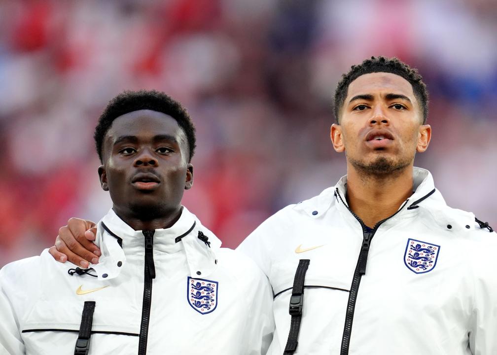 File photo dated 16/06/24 of England's Bukayo Saka (left) and England's Jude Bellingham ahead of the UEFA Euro 2024 Group C match at the Arena AufSchalke in Gelsenkirchen, Germany. One of English football's black pioneers has called for a continued fight against racism in sport, as the national team's make-up at the Euros was hailed for embodying the multi-ethnic society of today. Issue date: Thursday June 20, 2024.