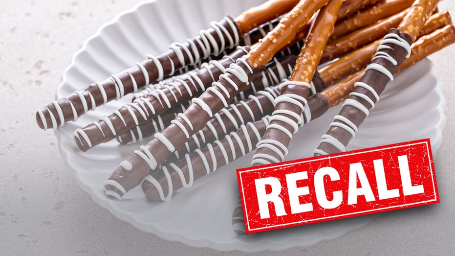 Pretzel rods coated in chocolate with "recall" over it.