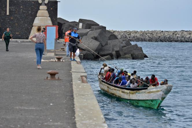 A small boat with migrants arrives at La Restinga on the Canary island of El Hierro, Spain on Wednesday Oct. 4, 2023. 