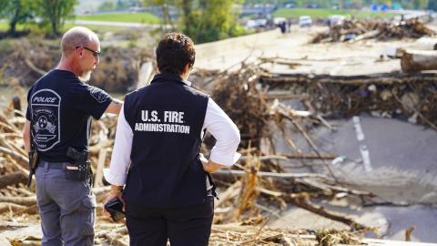 Erwin Police Chief Regan Tilson and U.S. Fire Administrator Dr. Lori Moore-Merrell observing the I-26 bridges that were damaged during Hurricane Helene in Unicoi County, Tennessee. (Photo: Federal Emergency Management Agency)