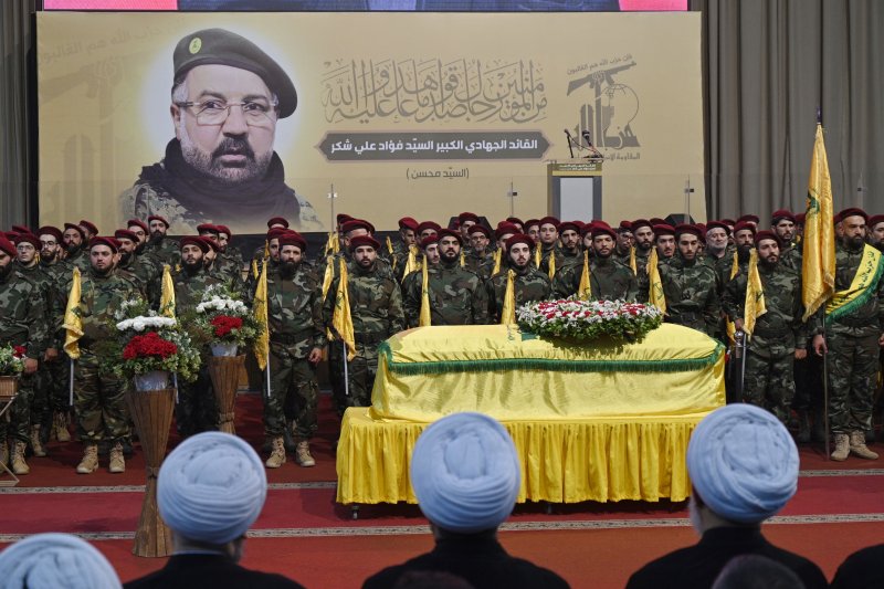 The U.S. Treasury Department Wednesday announced sanctions against Hezbollah's finance network and Syrian Captagon amphetamine trafficking that benefits both Hezbollah and thr SYrian Assad regime. Hezbollah fighters stand next to the coffin of late senior Hezbollah commander Fuad Shukr, killed in an Israeli strike, during the funeral procession in Beirut, Lebanon, Aug. 1, 2024. File photo by Wael Hamzeh/EPA-EFE