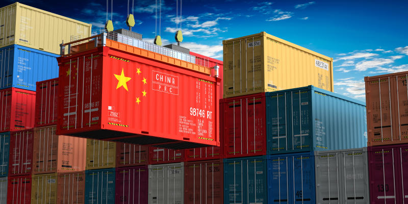 Freight shipping container with flag of China on crane hook. (Illustration: 123RF)