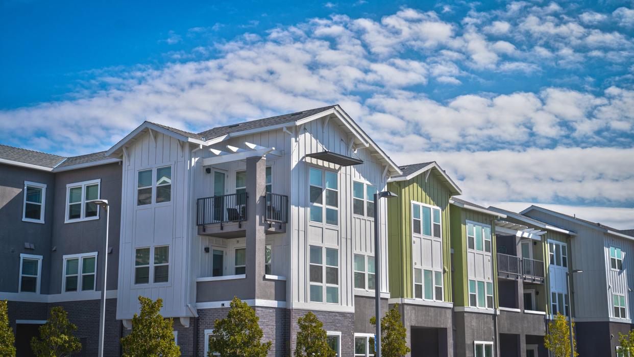 Angle view of an apartment building with a cloudy sky