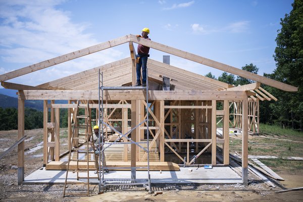 A home under construction with the framing done.