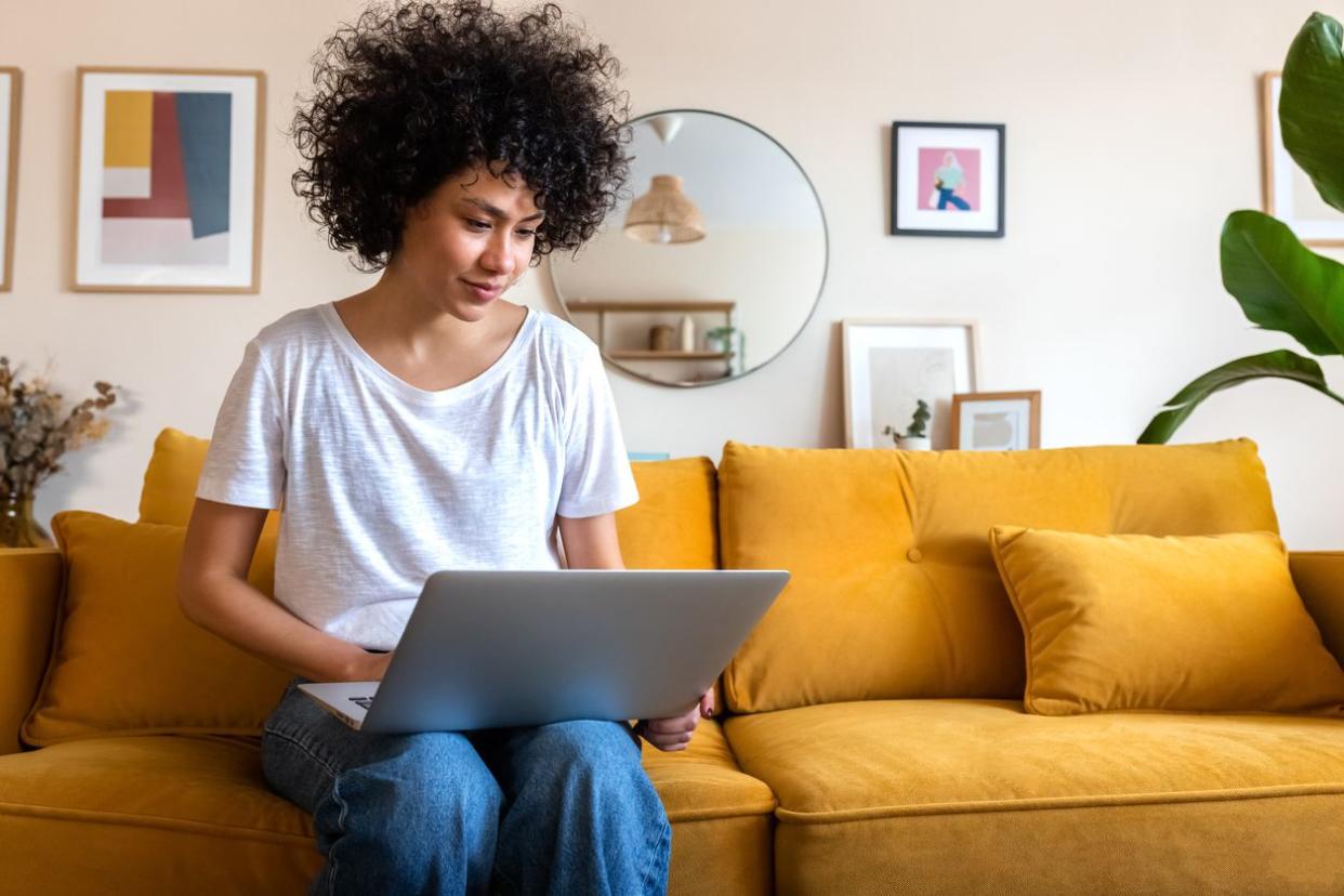 Woman sitting on the couch