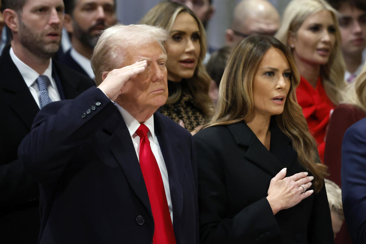 WASHINGTON, DC - JANUARY 21: U.S. President Donald Trump salutes as he and first lady Melania Trump attend the National Prayer Service at Washington National Cathedral on January 21, 2025 in Washington, DC. Tuesday marks Trump's first full day of his second term in the White House. (Photo by Chip Somodevilla/Getty Images)