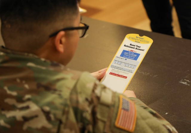 Sgt. Minh Le, the 88th Military Police Detachment’s S-1 noncommissioned officer in charge, attends a class on the Thrift Savings Plan at Camp Zama, Japan, Feb. 11, 2025. Han Xue, a certified financial planner, holds a monthly financial education...