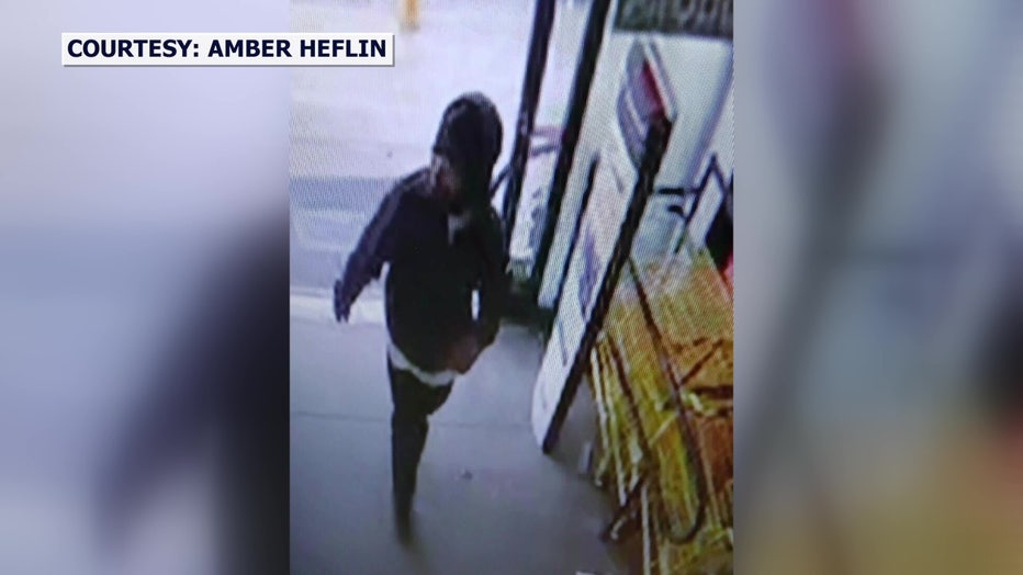 Surveillance footage footage of the man who punched the Dollar General clerk.