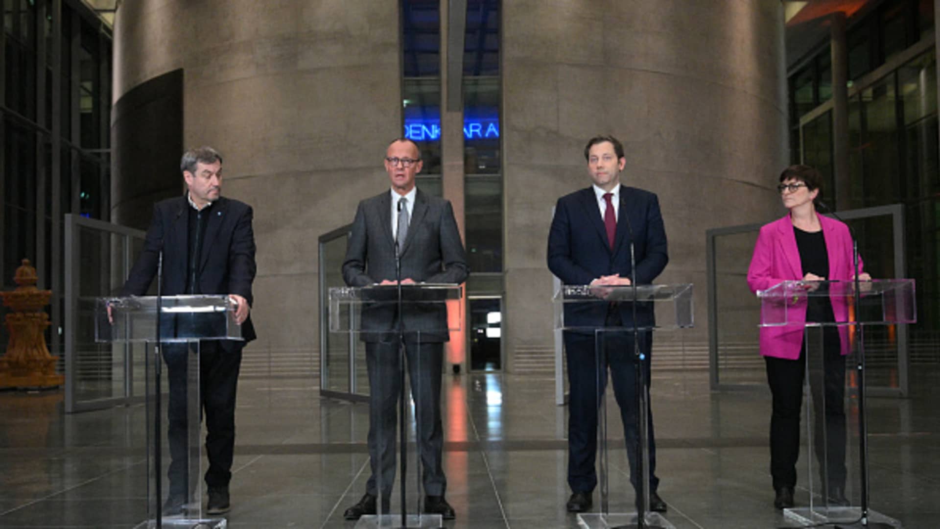 (From L) Bavaria's State Premier and Leader of the conservative Christian Social Union (CSU) Markus Soeder, Leader of Germany's Christian Democratic Union (CDU) Friedrich Merz, Germany's Social Democratic Party (SPD) co-leader and parliamentary group leader Lars Klingbeil and Germany's Social Democratic Party (SPD) co-leader Saskia Esken deliver a press statement at the Jakob Kaiser Haus parliamentary building in Berlin, on March 4, 2025.