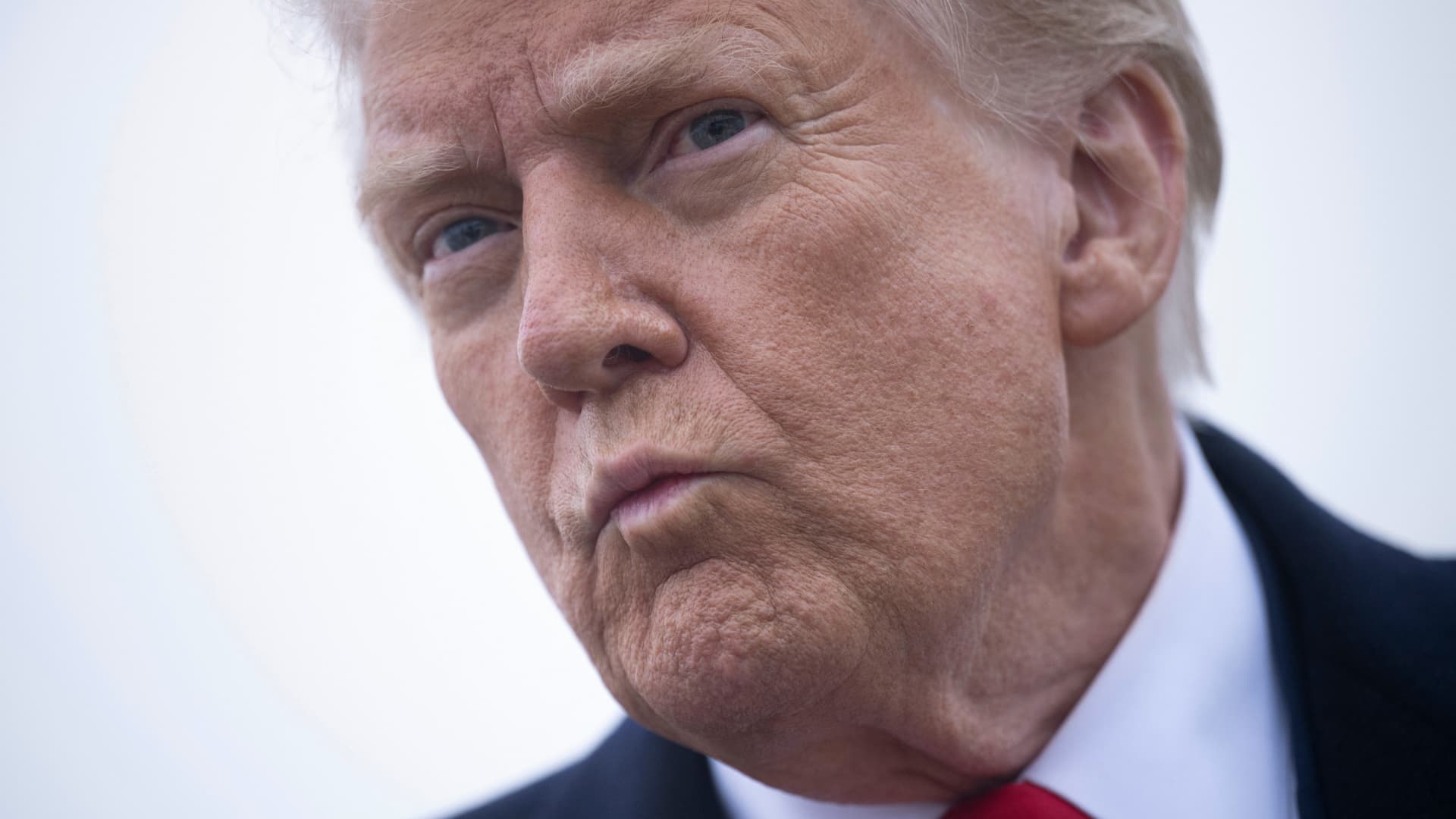 President Donald Trump speaks to the press about the conflict in Ukraine before boarding Air Force One at Andrews Air Force Base in Maryland on March 14, 2025.