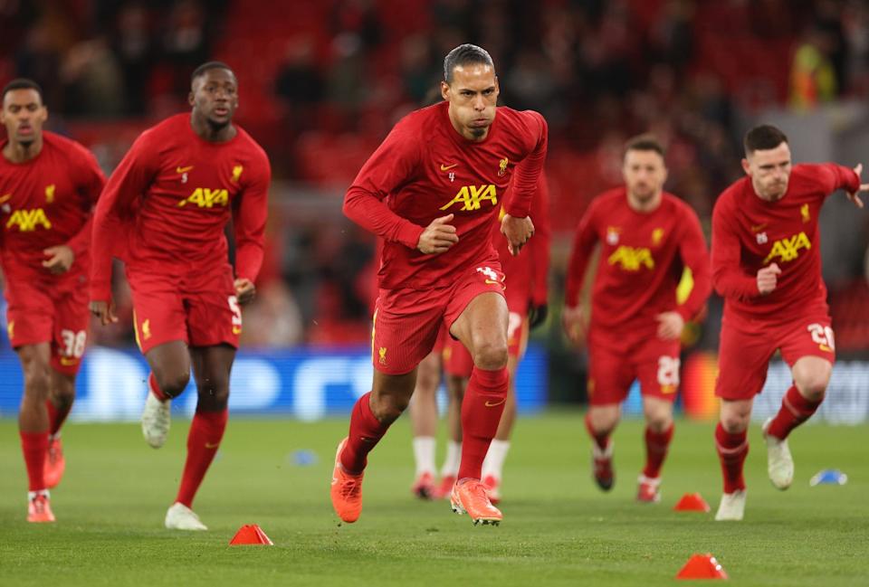 Virgil van Dijk and his Liverpool teammates warming up