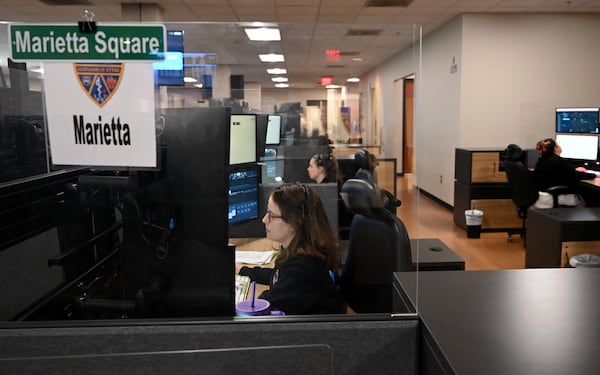 Dispatchers handle emergency matters at Cobb County’s 911 call and dispatch center in Marietta on Tuesday, March 11, 2025. (Hyosub Shin/AJC)