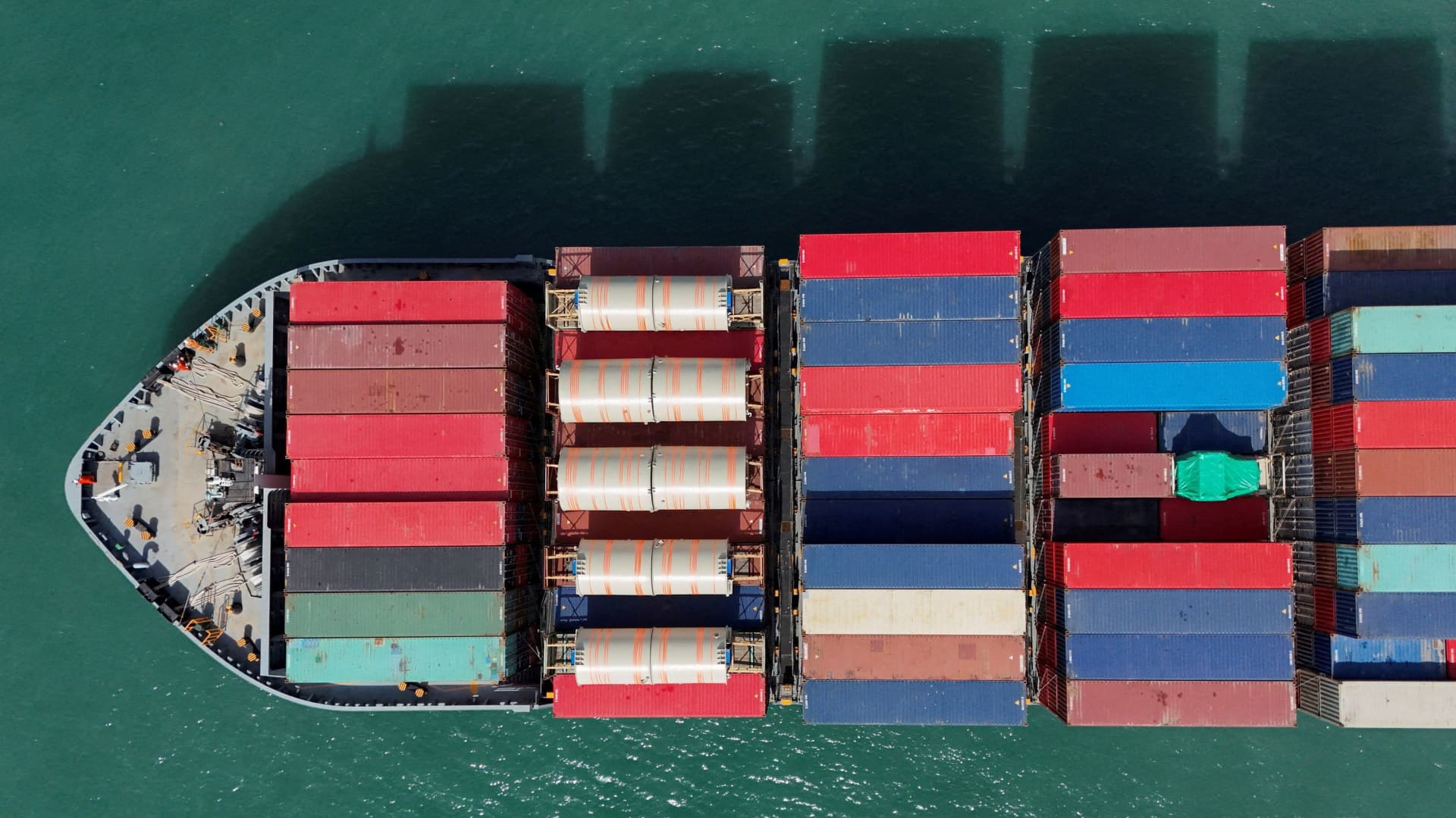 A drone view shows a cargo ship at Kwai Tsing Container Terminals in Hong Kong, China, April 16, 2025. 