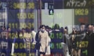 Asian currencies hit two-decade low, stocks mixed