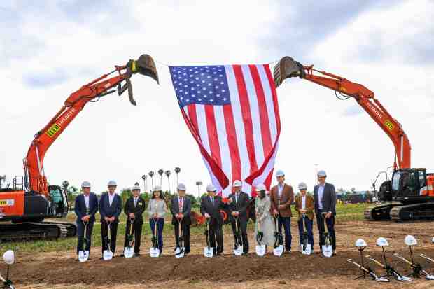 Tina Lee, CEO of T&T Supermarkets, fourth from right, and...