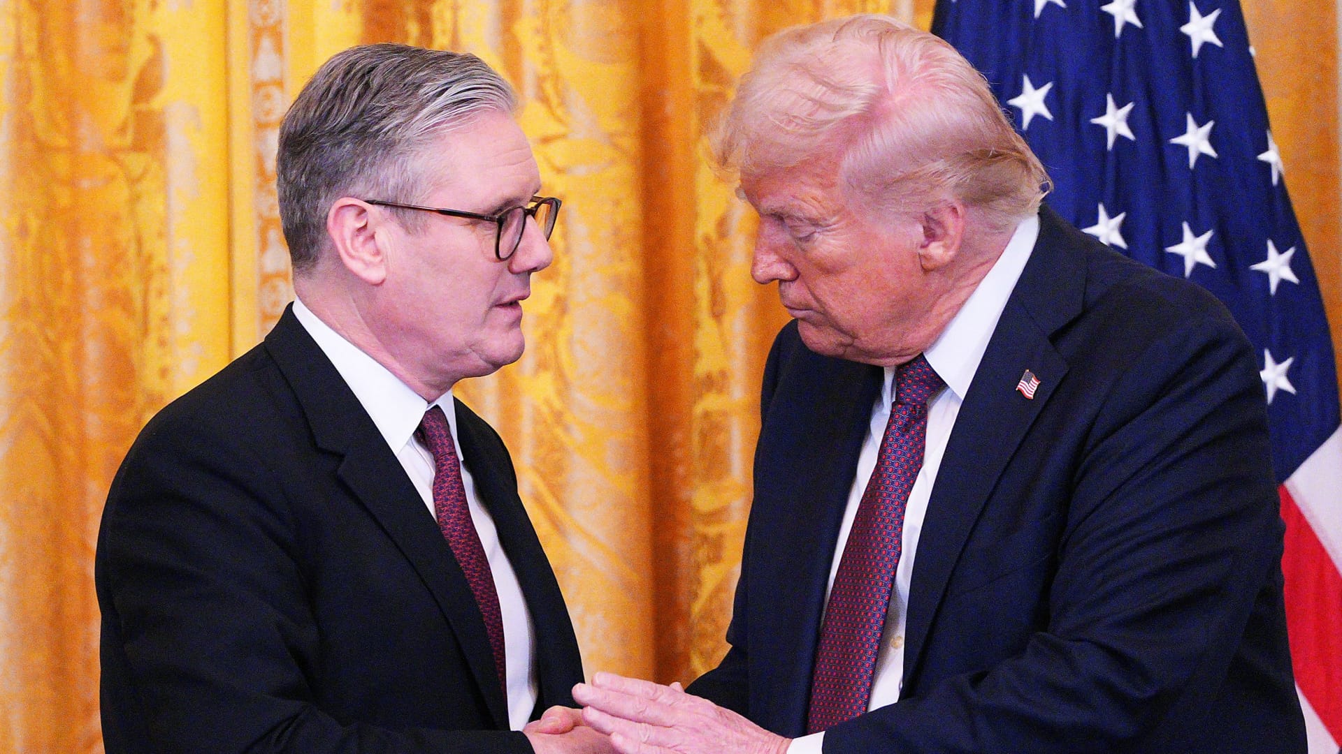 British Prime Minister Keir Starmer and U.S. President Donald Trump shake hands during a joint press conference in the East Room at the White House, Feb. 27, 2025 in Washington, D.C., U.S.