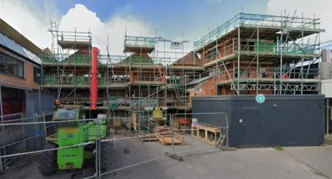 Google Photo of construction work stalled at Red Brick building C in Glastonbury