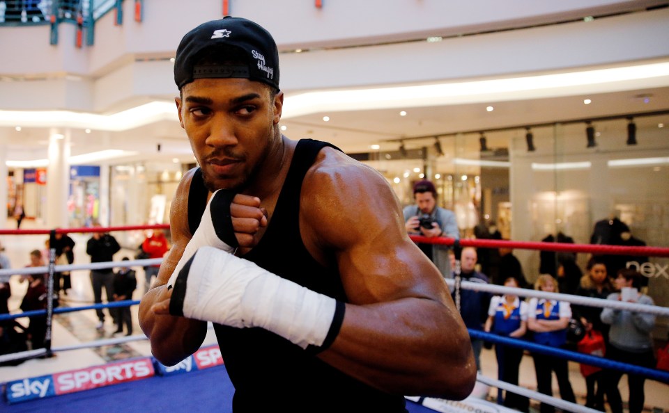 Anthony Joshua boxing in a shopping center.